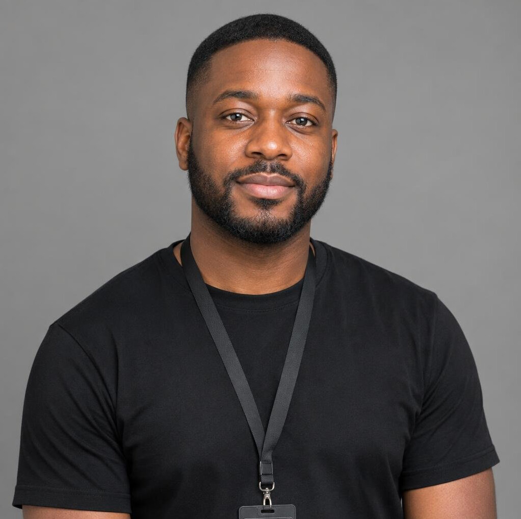 Portrait of a black British man working as a broadcast camera operator